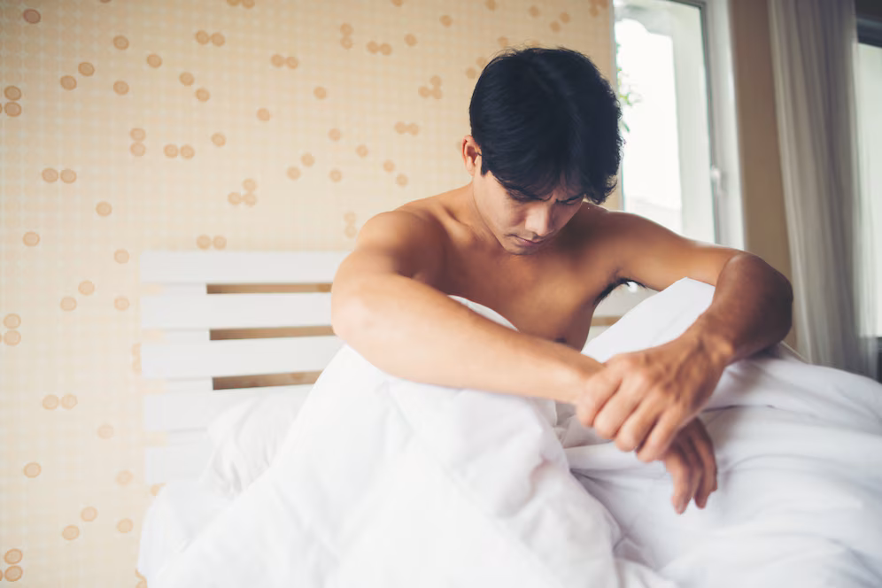 worried-man-sitting-bed-morning-serious-thinking-something_1150-5039